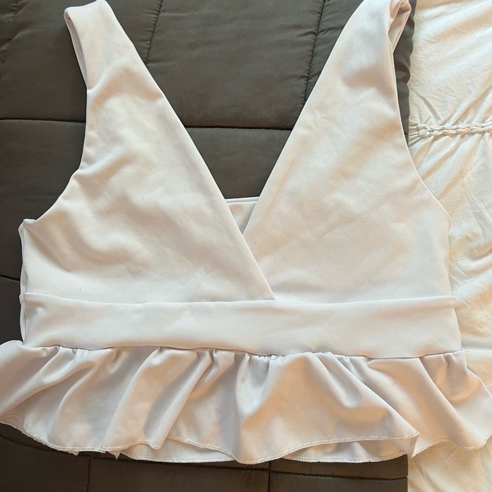 white peplum bottom top